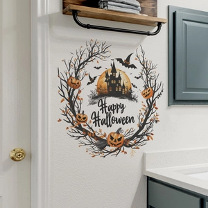 Halloween wall decal featuring a pumpkin wreath with a castle silhouette and bats