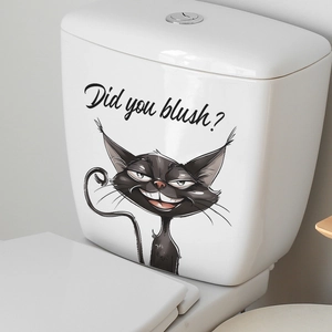 Detail of funny black cat toilet sticker with 'Did you blush?' text on white tank