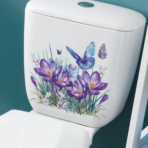 Detailed view of floral toilet sticker with purple crocuses and fluttering butterflies