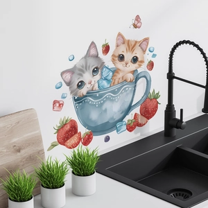 Detail of watercolor cat and strawberry wall sticker on white kitchen wall above a sink