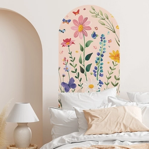 Arch wall decal with floral and butterfly illustrations on a soft pink background for bedrooms