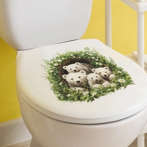 Close-up of polar bear family and daisy pattern on a white decorative toilet lid