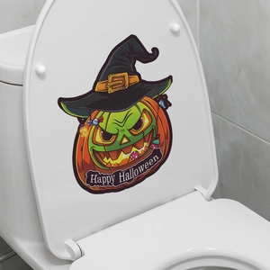 Detail of waterproof Halloween pumpkin toilet sticker with wizard hat and festive text