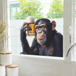 Creative wall sticker of a chimpanzee drinking beer on a white kitchen window background