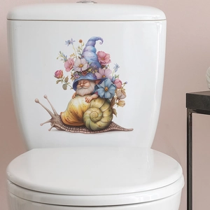 Detail of flower gnome riding snail sticker applied on a white ceramic toilet tank
