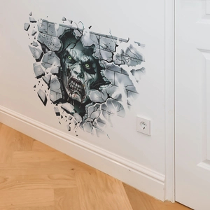 Detailed 3D wall sticker featuring a scary zombie with green eyes breaking through a brick wall