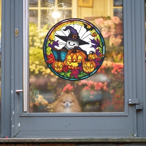 Halloween window sticker featuring a cute ghost and pumpkins in a colorful stained glass style