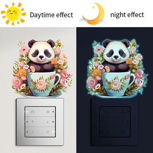 Luminous wall sticker featuring a cartoon panda in a floral teacup for light switches