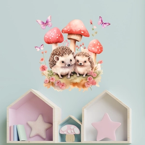 Luminous wall sticker showing cute hedgehogs and mushrooms on a blue nursery wall