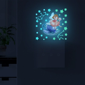 Glow-in-the-dark wall sticker featuring fairy in tea cup and constellations for room decor