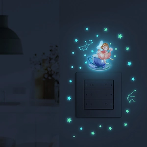 Luminous wall stickers showing a fairy in a tea cup with glowing stars around a switch