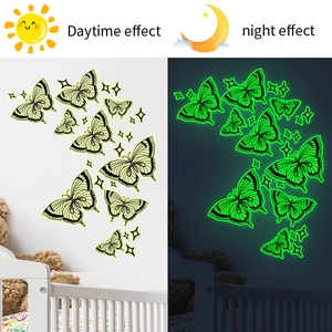 Luminous butterfly wall stickers showing daytime look and green night glow effect