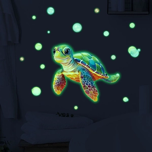 Glow-in-the-dark turtle wall sticker with luminous green bubbles for kids' bedroom decor