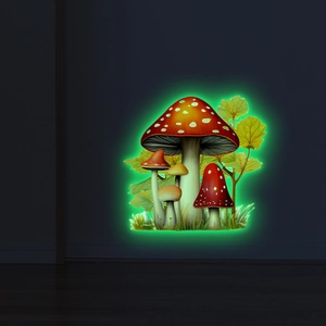 Detailed view of luminous red mushroom wall stickers glowing green in the dark for home decor