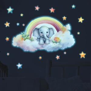 Luminous wall sticker showing a cute elephant on a cloud with glowing stars and rainbow