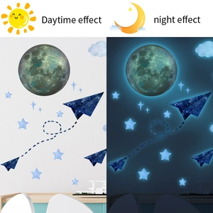 Luminous wall sticker set showing daytime effect and bright blue night glow comparison