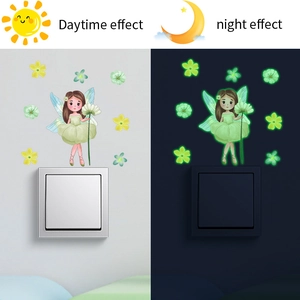 Luminous fairy and flower wall sticker showing daytime and green night glow effect
