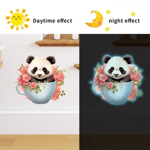 Luminous wall sticker featuring cartoon panda in teacup with daytime and night glow effect