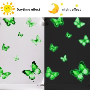 Luminous green butterfly wall stickers showing day and night glow effects for decor