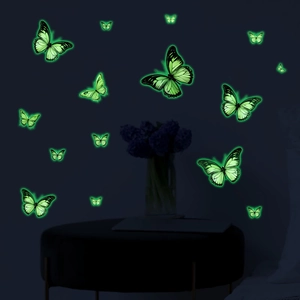 Glow in the dark butterfly wall stickers set showing bright green luminous effect on dark wall