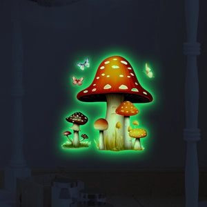 Luminous wall stickers featuring red mushrooms and butterflies glowing in the dark room