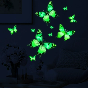 Luminous green butterfly wall stickers in various sizes for glowing home wall decoration