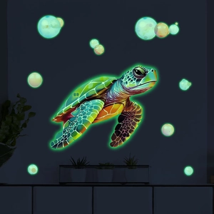 Luminous turtle wall sticker glowing bright green in the dark with bubble decals for nursery