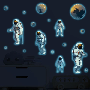 Luminous astronaut and planets wall stickers set for glow in the dark kids room decor