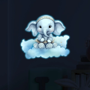 Luminous cartoon elephant on a cloud wall sticker glowing in a dark kid's bedroom