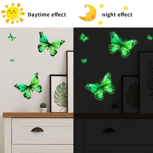 Luminous green butterfly wall stickers showing daytime decor and night glow effects