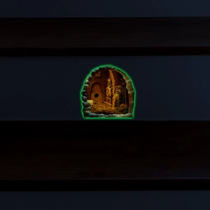 Glow-in-the-dark miniature mouse hole sticker with workshop scene and luminous green outline