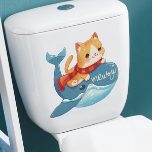 Cartoon orange cat riding a blue whale toilet sticker for home bathroom wall decoration