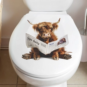 Funny highland cow reading newspaper bathroom wall sticker on a white toilet lid