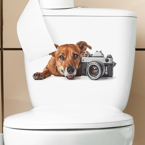 3D wall sticker featuring a cute brown dog with a vintage camera on a white toilet tank