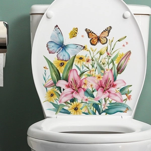 Floral toilet seat decal with pink lilies and blue butterflies on white ceramic