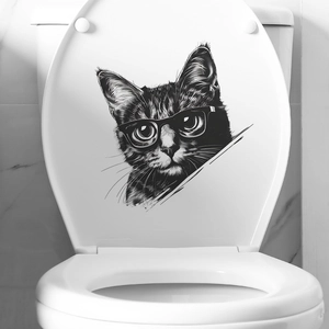 Artistic black and white cat wall sticker with glasses on a white bathroom toilet lid