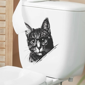 Artistic cat wall sticker featuring a black cat with glasses on white toilet tank