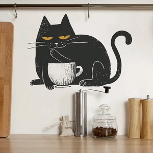 Whimsical black cat wall sticker holding a coffee cup in a modern kitchen setting