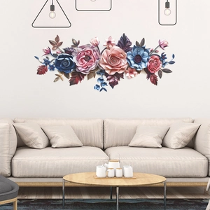 Detailed 3D floral wall art set with pink and blue flowers above a modern living room sofa