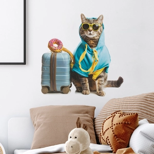 Detail of travel cat wall sticker featuring cool grey tabby in blue hoodie and sunglasses