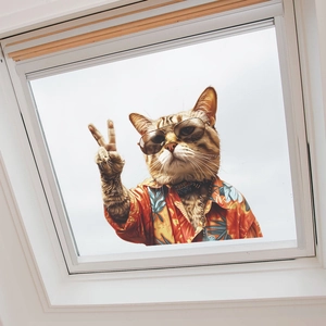 Detail of funny tabby cat wall sticker with sunglasses on a white framed skylight window