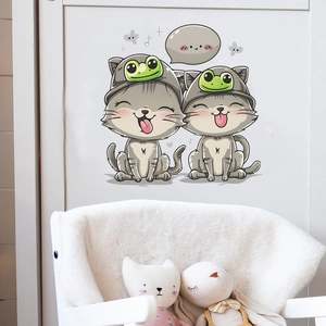 Cartoon grey cats with frog hats on a wall, decorative stickers for nursery rooms