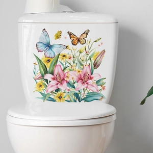 Floral toilet decal with pink lilies and colorful butterflies on white ceramic tank