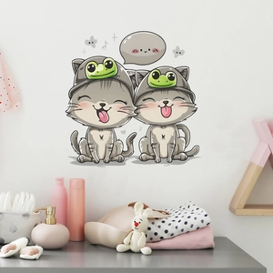 Detailed view of funny cartoon cat wall stickers in a cozy nursery room setting