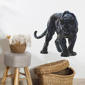 Detail of fierce black panther wall sticker showing muscular texture in a home setting