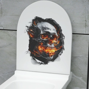 Dettaglio adesivo 3D teschio di Halloween con effetto fuoco che rompe il coperchio del water