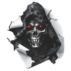 Dettaglio macro dell'adesivo 3D per Halloween con teschio, effetto strappo e occhi rossi