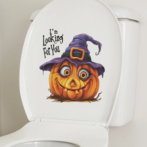 Detail of Halloween toilet sticker featuring a cartoon pumpkin witch with spooky text