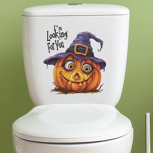 Halloween toilet lid decal featuring a cartoon pumpkin with witch hat and text