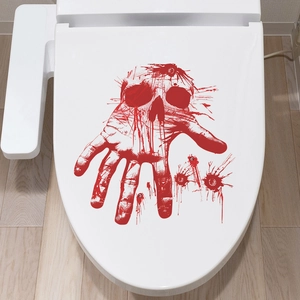 Bloody handprint and skull toilet seat decal for spooky Halloween bathroom decoration